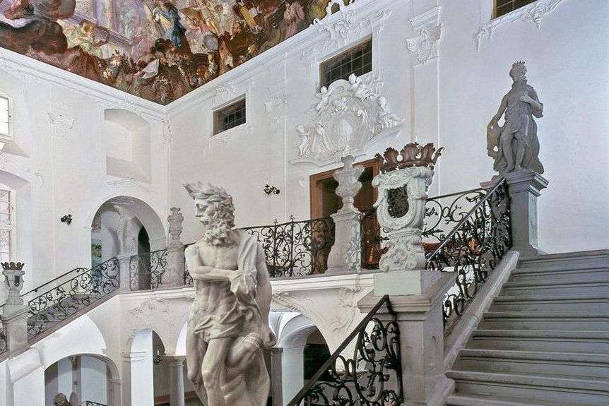 photo: Staatliche Schlösser und Gärten, Arnim Weischer Staircase with statuary and ceiling fresco, Meersburg New Palace